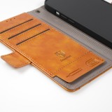 Etui cuir iPhone 17e / 16e - Flip Wallet en cuir véritable avec stripe design et compartiment à cartes - Brun