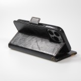 Etui cuir iPhone 17e / 16e - Flip Wallet en cuir véritable avec stripe design et compartiment à cartes - Noir