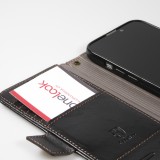 Etui cuir iPhone 17e / 16e - Flip Wallet en cuir véritable avec stripe design et compartiment à cartes - Noir
