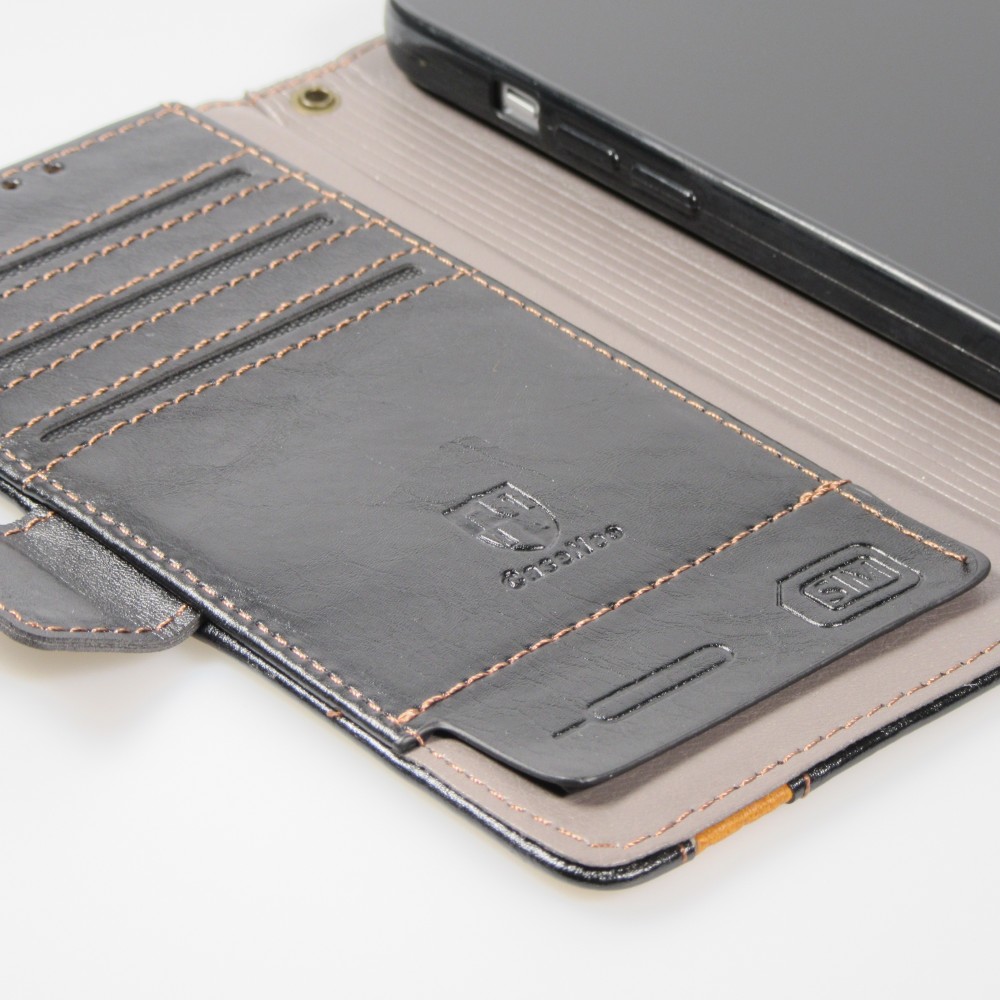Etui cuir iPhone 17e / 16e - Flip Wallet en cuir véritable avec stripe design et compartiment à cartes - Noir