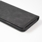 Etui cuir iPhone 17e / 16e - Flip Wallet vintage avec fermeture aimantée et compartiment cartes - Noir