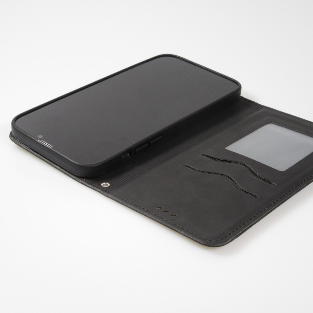 Etui cuir iPhone 17e / 16e - Flip Wallet vintage avec fermeture aimantée et compartiment cartes - Noir