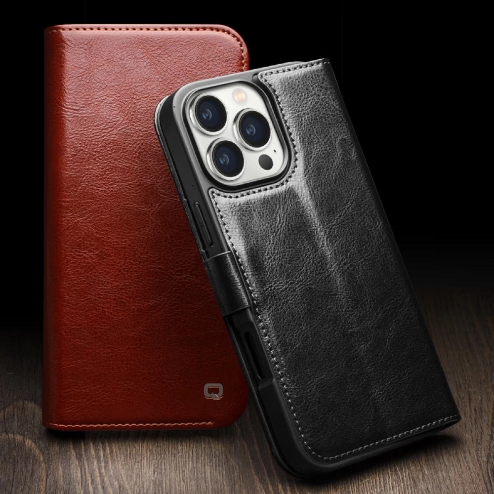 Fourre iPhone 16 Pro - Flip Qialino cuir véritable avec fermeture magnétique - Noir